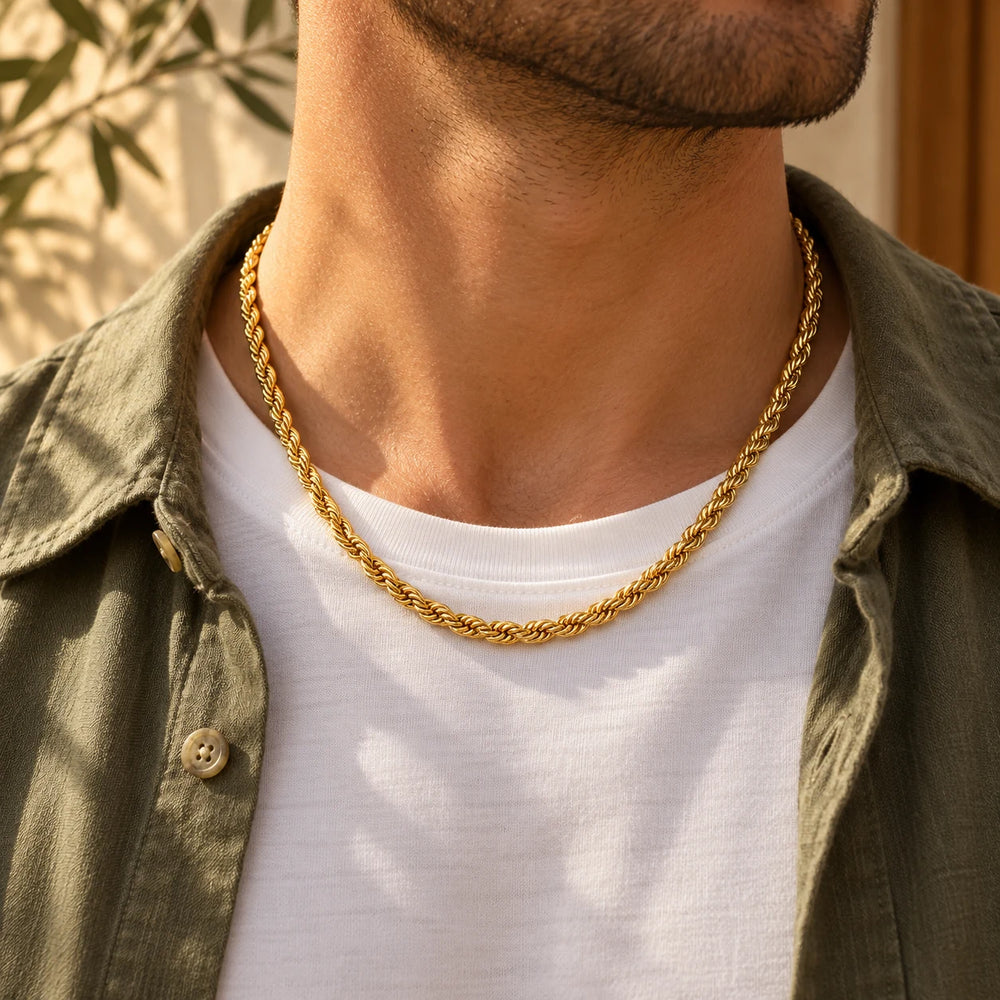 Gold-tone 5 mm rope chain necklace worn over a white t-shirt and olive overshirt — true size: the rope chain is 5 mm thick