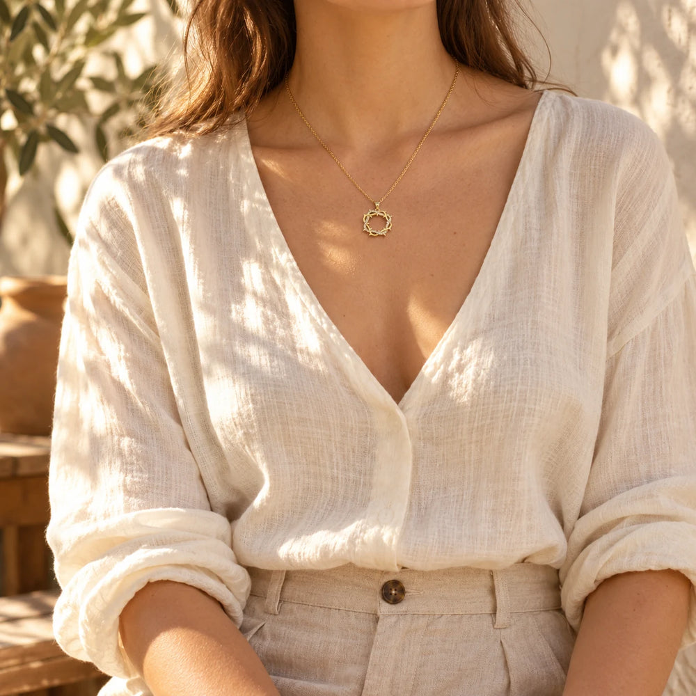 Silver-tone thorn wreath necklace worn at the collarbone — true size: the stone-set thorn ring is 22 mm across, about 28 mm tall with its small bail, on a fine cable chain about 1.1 mm thick