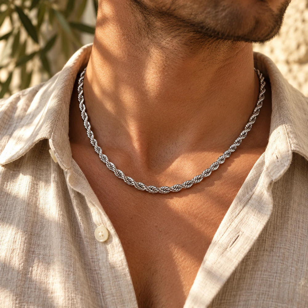 Silver-tone 5 mm rope chain necklace worn at the collarbone with an open linen shirt — true size: the rope chain is 5 mm thick