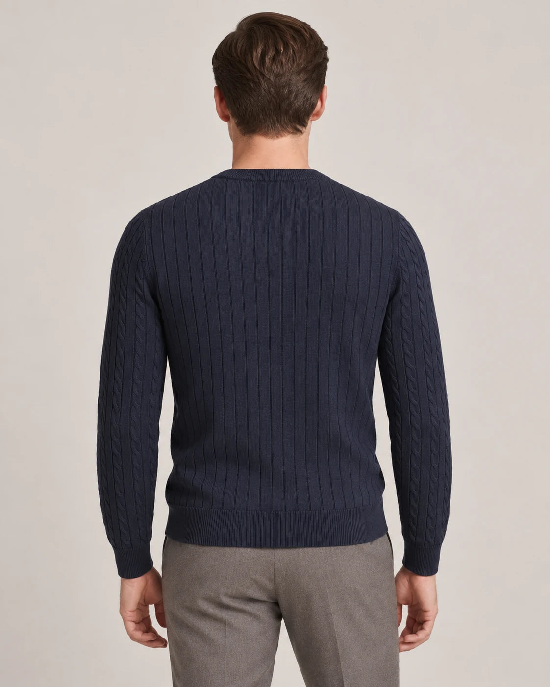 Man wearing the Kade navy crew neck sweater, back view with ribbed back - Model Back View