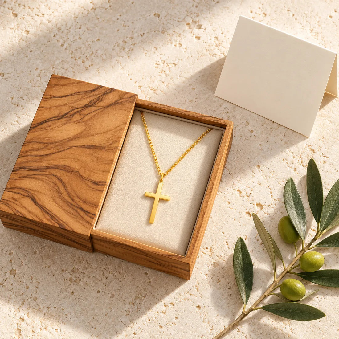 The Olivet gift box with a fine gold cross necklace and a folded verse card